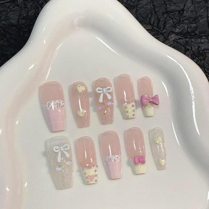 10ชิ้นฝรั่งเศสหวานน่ารักที่ทําด้วยมือกดบนเล็บโบว์สาวหัวใจลูกปัดเหล็กขั้นสูงแพทช์เล็บปลอมที่ถอดออกได้นํามาใช้ใหม่
