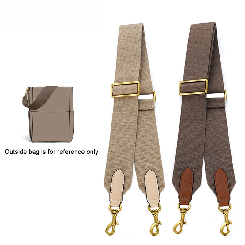 กระเป๋าสะพายไหล่ทำจากผ้าใบ มาพร้อมสายคล้องสำรองกว้าง สะดวกในการใช้งานและปรับแต่งได้ตามต้องการ