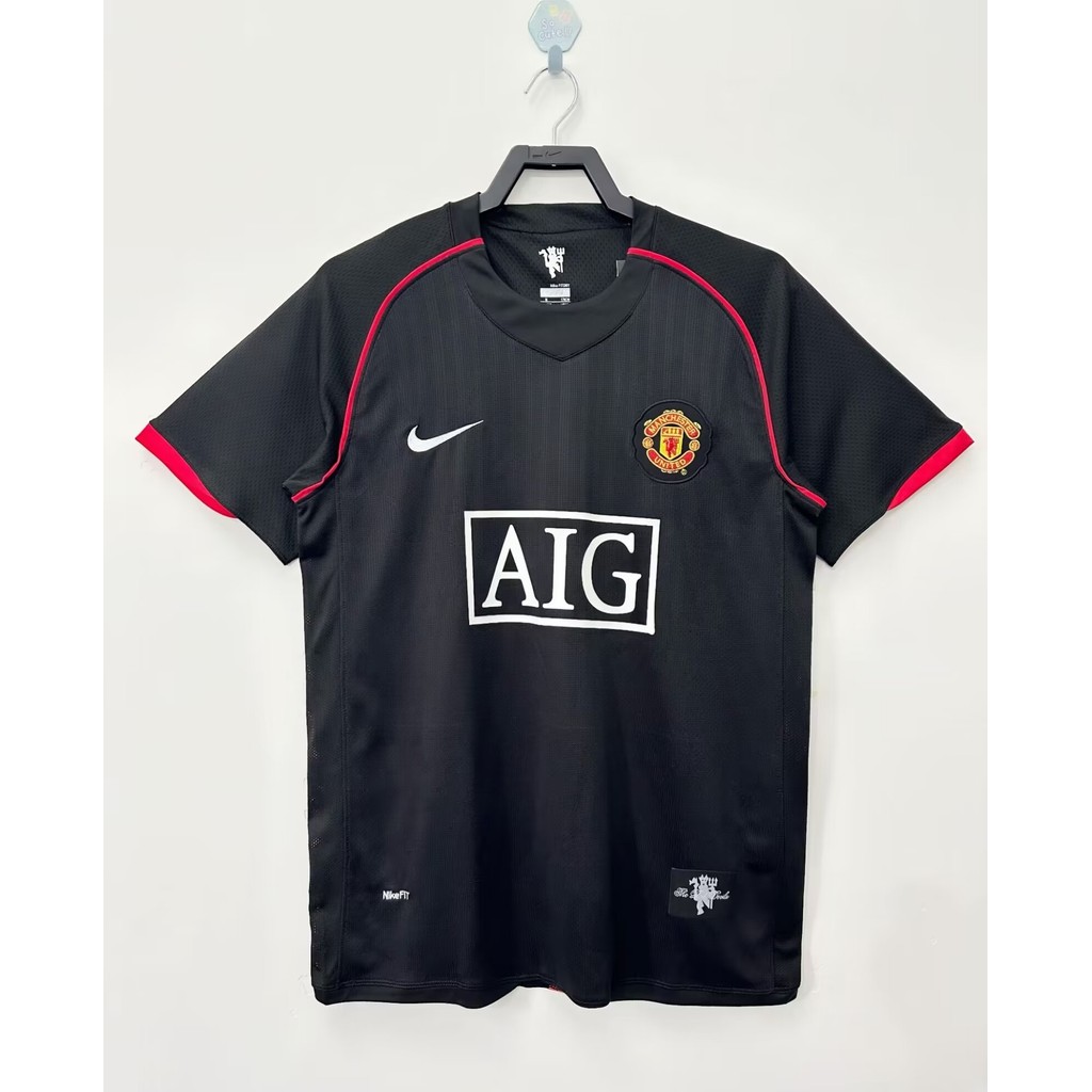 2007-08 เสื้อยืดแขนสั้นฟุตบอลย้อนยุคทีมแมนเชสเตอร์ยูไนเต็ดเยือนสีดํา