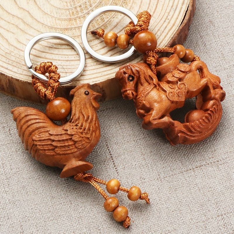 Zodiac มะฮอกกานีรถพวงกุญแจสามมิติมะฮอกกานีดาบมะฮอกกานีแขวนปลอดภัยรถ Amulet Mias Shop20250818