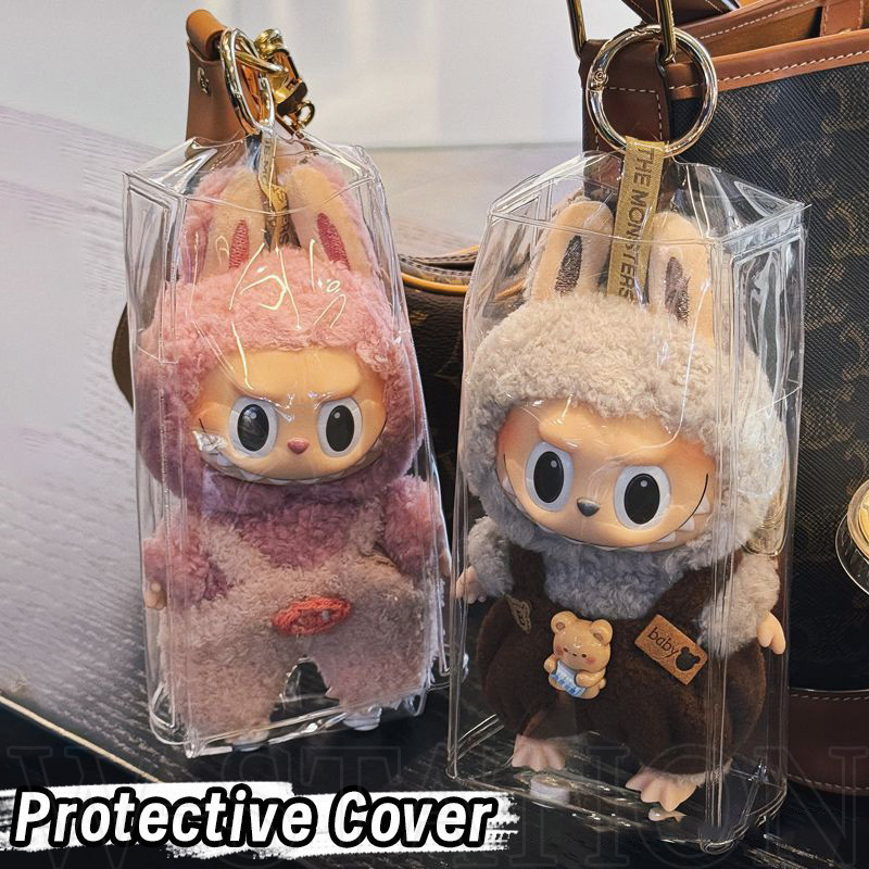 Labubu ปลอกป้องกันโปร่งใส - กระเป๋าเก็บตุ๊กตา PVC - ตัวป้องกันของเล่นขนยาว - แบบพกพา ใส กันฝุ่น - จี้พวงกุญแจกระเป๋าเป้สะพายหลัง - กล่องแสดงตุ๊กตาออกนอกบ้าน