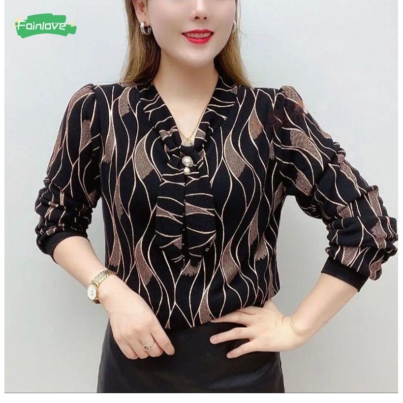 เสื้อเชิ้ตพิมพ์ลายผู้หญิงแขนยาวคอวีหลวมฤดูร้อนใหม่ลําลองด้านบน