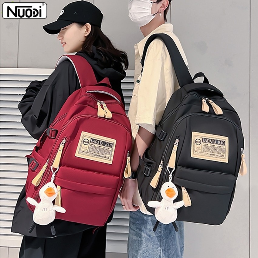 Nuodi กระเป๋านักเรียนสีพื้น กระเป๋าเป้น่ารัก สไตล์เกาหลี กันนํ้า ระบายอากาศได้ดี สายปรับความยาวได้ใส่โน๊ตบุ๊กได้