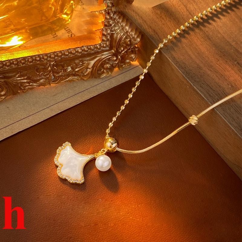 Mother-oyster Ginkgo จี้สร้อยคอมุกผู้หญิงฤดูใบไม้ร่วงฤดูหนาว Non-Fade หรูหรา Niche High-End เสื้อกัน
