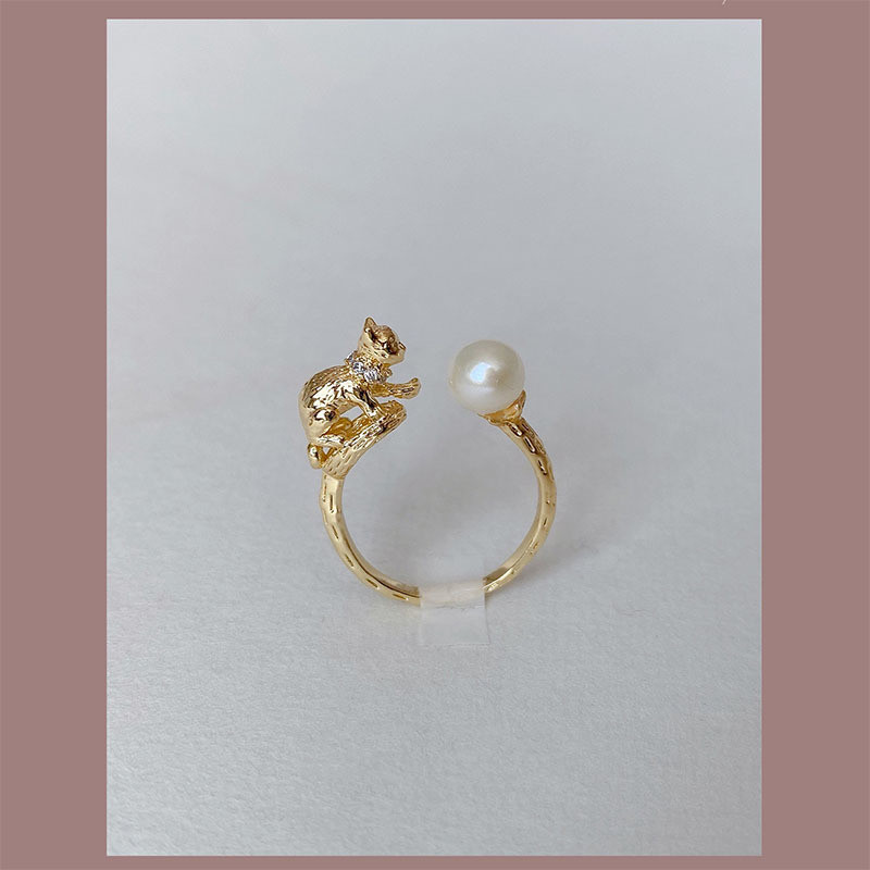 ที่น่าสนใจ Cat with Pearl Ball Cute Open Pearl Ring Niche Design Fashion All-Match Classy Ring 8.20
