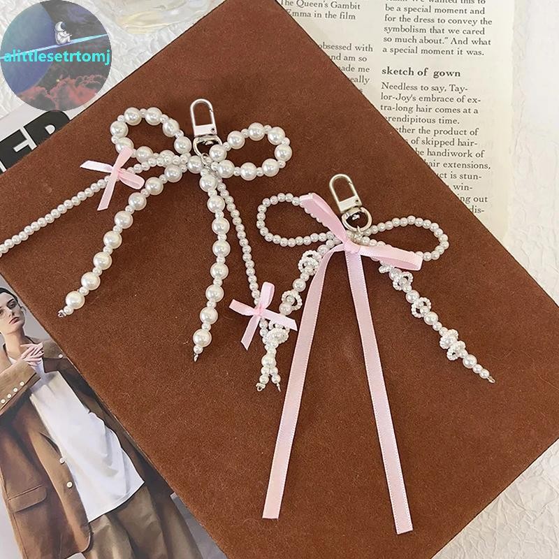 Alittlese เกาหลีหวานลูกปัด Pearl Bowknot ริบบิ้นพวงกุญแจพวงกุญแจ Y2K ความงาม Key Chain สําหรับสาวกระเป๋าจี้อุปกรณ์เสริม TH