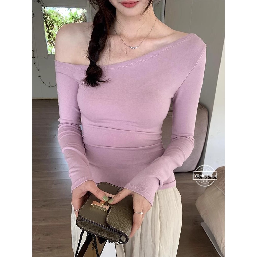 เสื้อยืดแขนยาวไหล่ลาดสีม่วงอ่อนโยนสําหรับฤดูใบไม้ร่วงของผู้หญิง