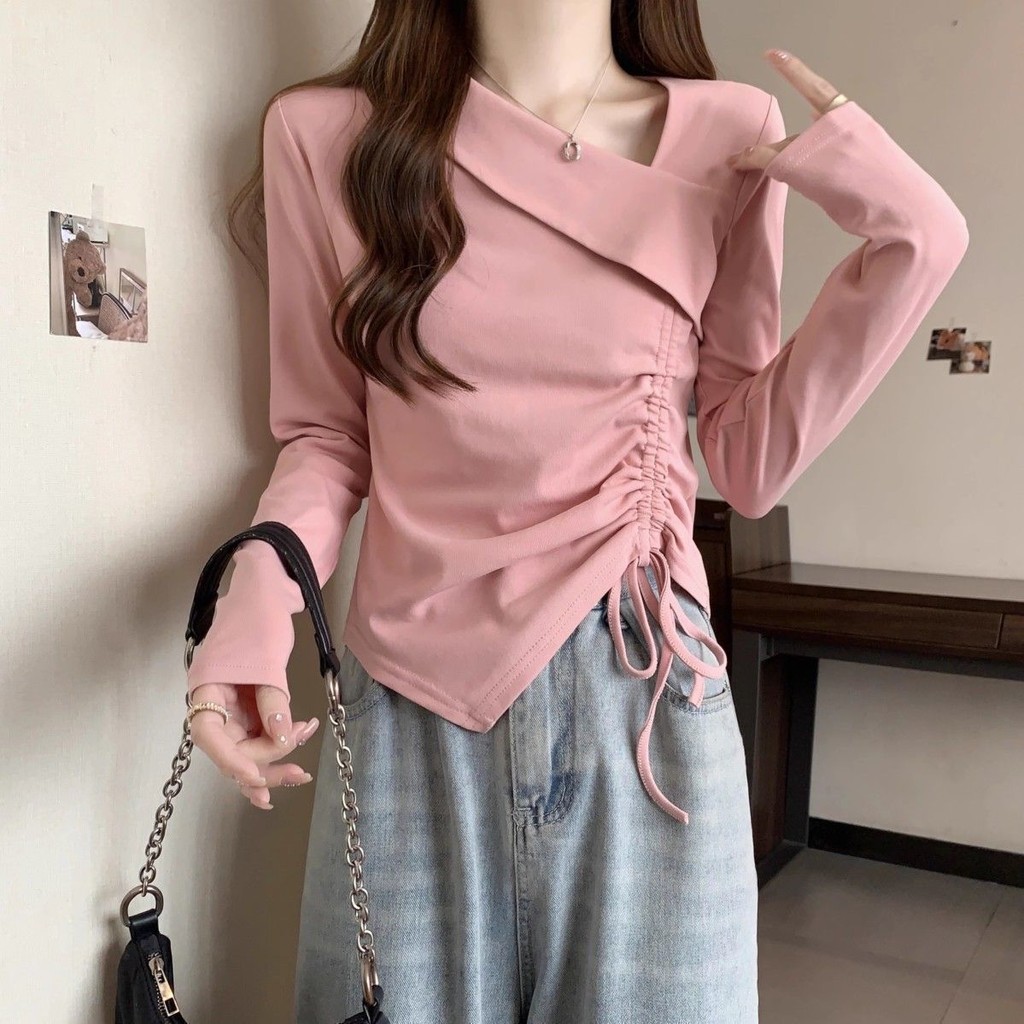 ไม่สม่ําเสมอแขนยาวเสื้อยืดผู้หญิง 2024 ฤดูใบไม้ร่วงเกาหลีรุ่นแฟชั่นการออกแบบ Drawstring Bottoming เสื้อ Slimmer ดูด้านในด้านบน