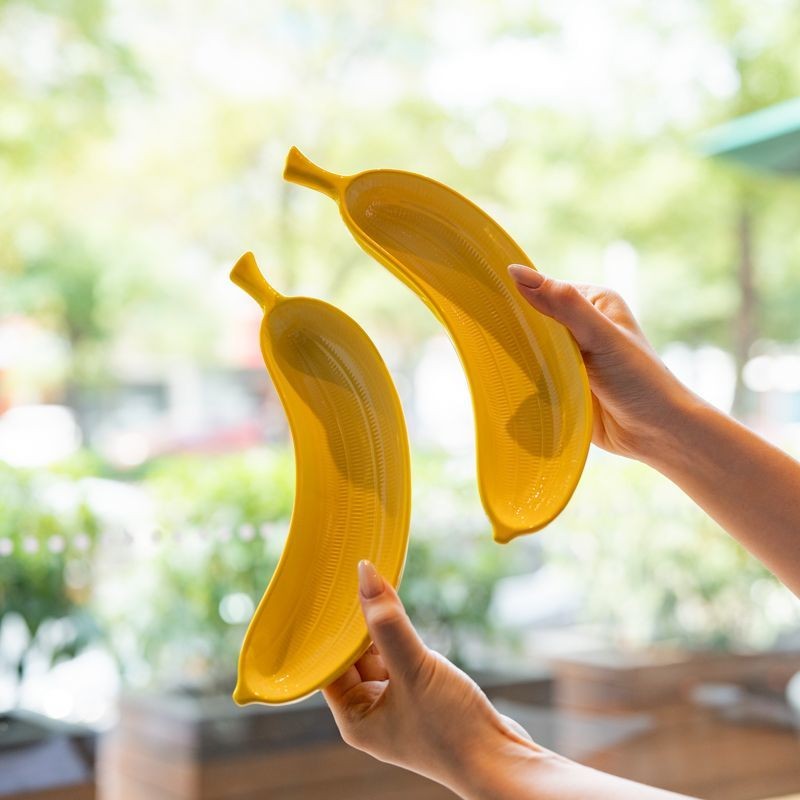 กล้วยรูปจานเซรามิกขนมผลไม้ครัวเรือนพิธีความรู้สึกคาราเมลพุดดิ้งแผ่นผลไม้รูปร่างสร้างสรรค์บนโต๊ะอาหาร - รูปที่ 5