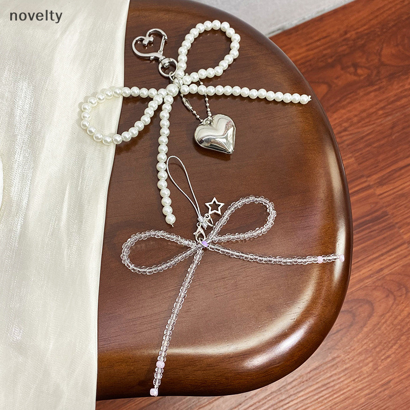 Nly ที่ละเอียดอ่อนลูกปัดพวงกุญแจ Handmade Bow รูปพวงกุญแจหัวใจพวงกุญแจเครื่องประดับ Pearl ตกแต่งสําหรับกระเป๋าและโทรศัพท์ N