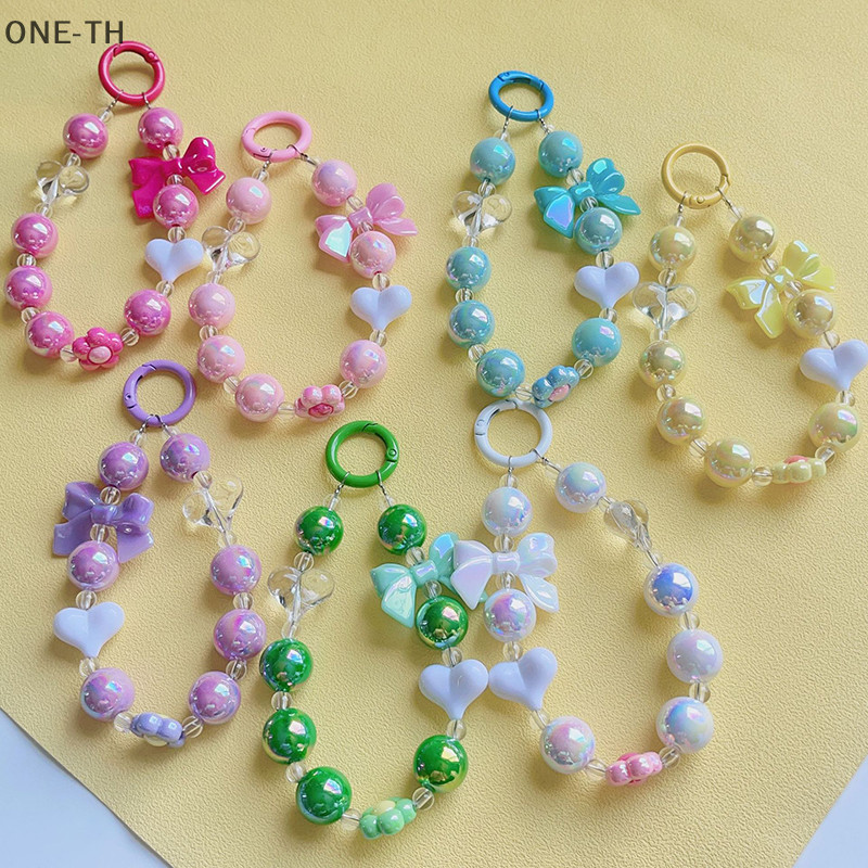One-th Creative ใหม่ดอกไม้ขนาดเล็กโบว์ลูกปัดจี้โทรศัพท์มือถือแขวนเครื่องประดับหูฟัง DIY จี้กระเป๋าเป้สะพายหลังตกแต่งใหม่