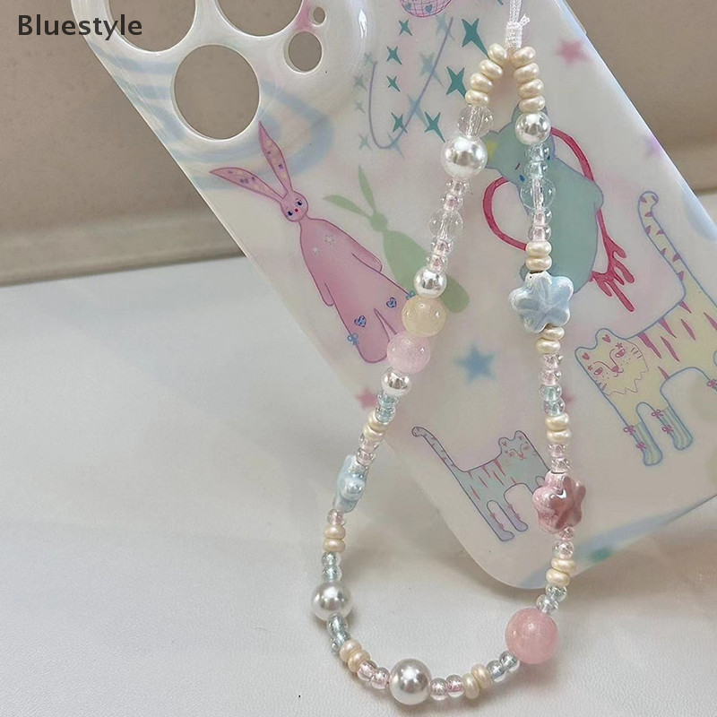 Bluestyle ฤดูใบไม้ผลิหวานเซรามิคดอกไม้ลูกปัดสายคล้องโทรศัพท์ Charm Chain สําหรับโทรศัพท์ Lanyard พวงกุญแจผู้หญิงสาวกระเป๋ากล้องจี้แขวนใหม่