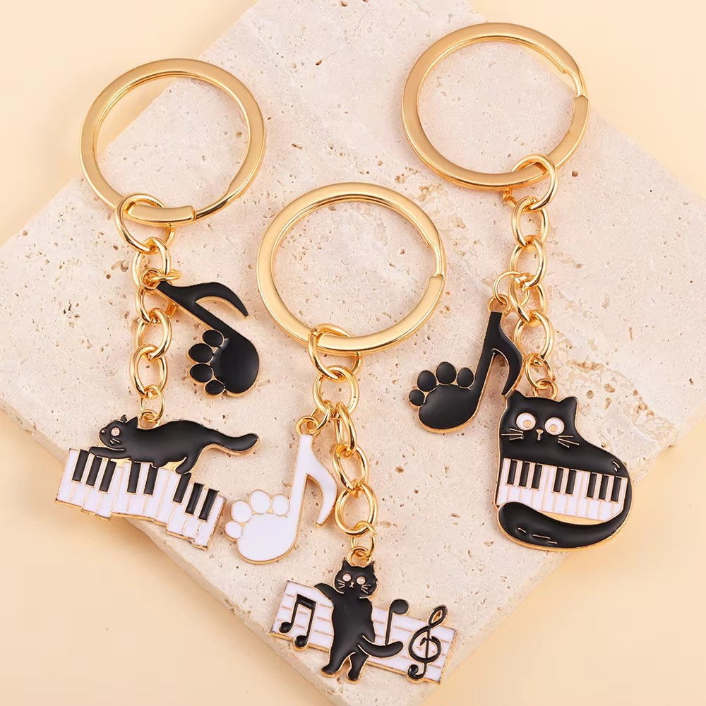 Creative Gothic เปียโนสีดําแมวดนตรี Note Charms Key ผู้ถือสัตว์น่ารักพวงกุญแจ DIY เครื่องประดับของขวัญสําหรับผู้หญิงผู้ชายเด็ก