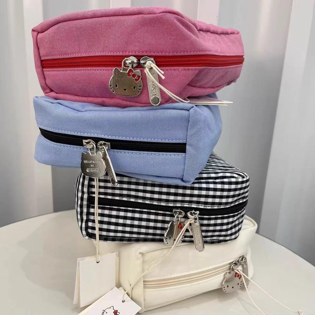 LeSportsac  เลสปอร์ตแซค สไตล์ใหม่ คิตตี้ การ์ตูนปักกระเป๋าหญิง/กระเป๋าเก็บแต่งหน้ากระเป๋าคลัทช์ 7121