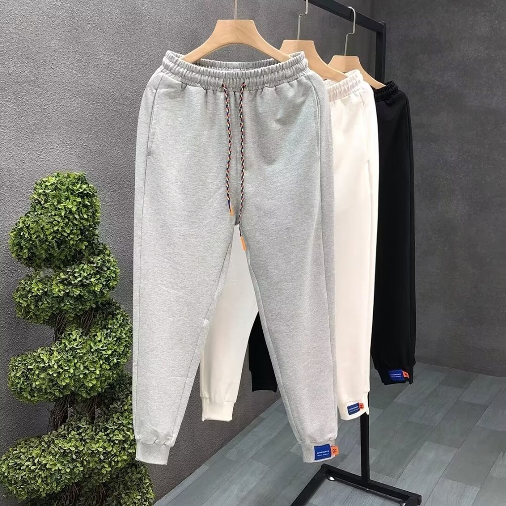 M-5XL กางเกงวอร์มชายสไตล์เกาหลี ทรงหลวมขากว้าง เนื้อผ้าบาง สีพื้น ออกกำลังกาย พลัสไซส์ ดำ/เทา