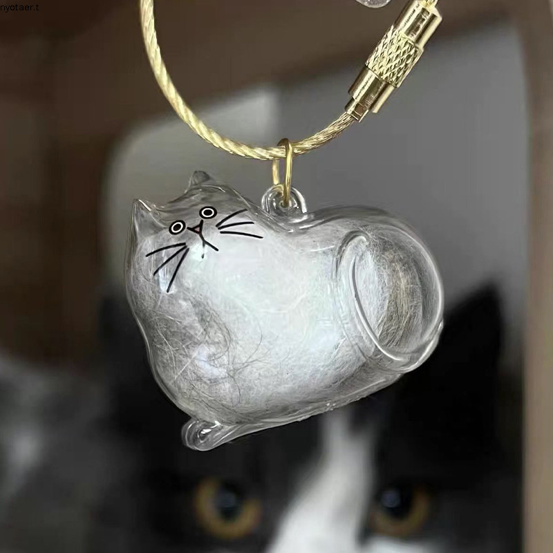 🌷COD🌷จี้กล่องเก็บขนแมวแบบใสแบบใหม่มีหลากหลายสไตล์ให้เลือกพวงกุญแจจี้แคปซูลเก็บขนแมว