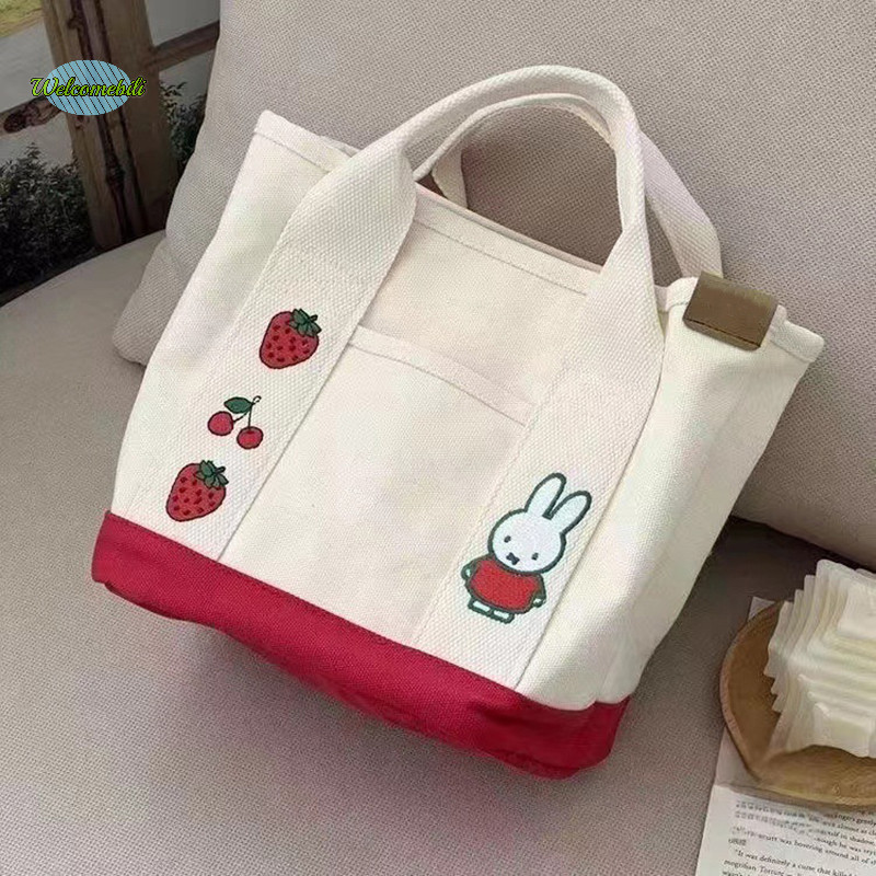 [ยินดีต้อนรับ] การ์ตูน Miffy Canvas Handheld Bucket Bag พิมพ์ Tote Bag กระเป๋าสะพายยอดนิยมผ้าใบ Casual Commuter Bag กระเป๋าช้อปปิ้งใหม่
