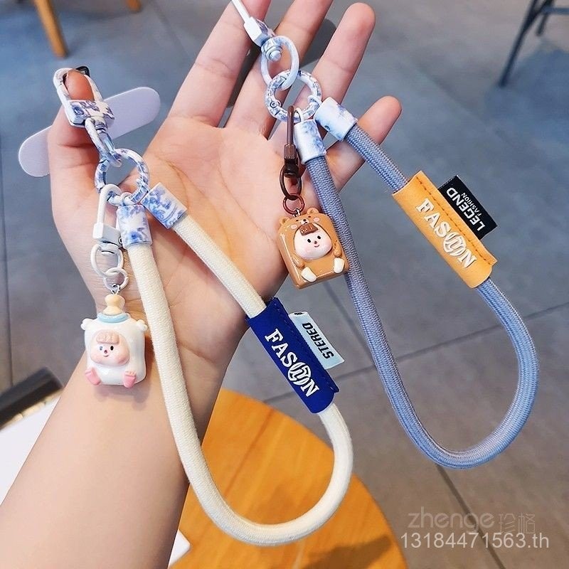 สายคล้องโทรศัพท์มือถือเชือกรัดข้อมือแบบถักหนาแน่นน่ารักการ์ตูนจี้โซ่แบบพกพาแบบสั้นเชือกแขวนป้องกันการสูญหายกลางแจ้ง