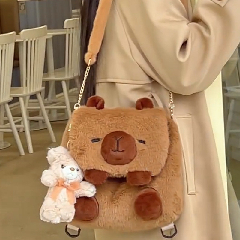 น่ารักตุ๊กตา คาปิบาระ กระเป๋าสะพายกระเป๋าสะพายข้างการ์ตูนมัลติฟังก์ชั่นักเรียนกระเป๋าเป้สะพายหลัง