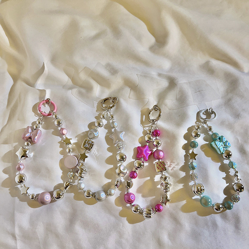 อุปกรณ์เสริมโทรศัพท์มือถือ อิน หวานเย็นสามมิติดาวโบว์สร้อยข้อมือลูกปัดเคสโทรศัพท์พวงกุญแจแบบพกพาป้องกันการสูญหายโซ่แขวนแบบพก