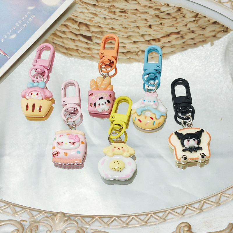 SANRIO ขนมปัง ซานริโอ ทํานอง คุโรมิ อบเชยพวงกุญแจสุนัขการ์ตูนสาวหัวใจอบเชยสุนัข ชาม กระเป๋ากระเป๋าจี้