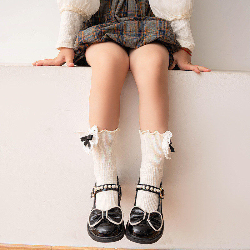สาวถุงเท้าผ้าฝ้ายลูกไม้โบว์เวอร์ชั่นเกาหลีของวิทยาลัยสไตล์ถุงเท้ากลางลูกวัว