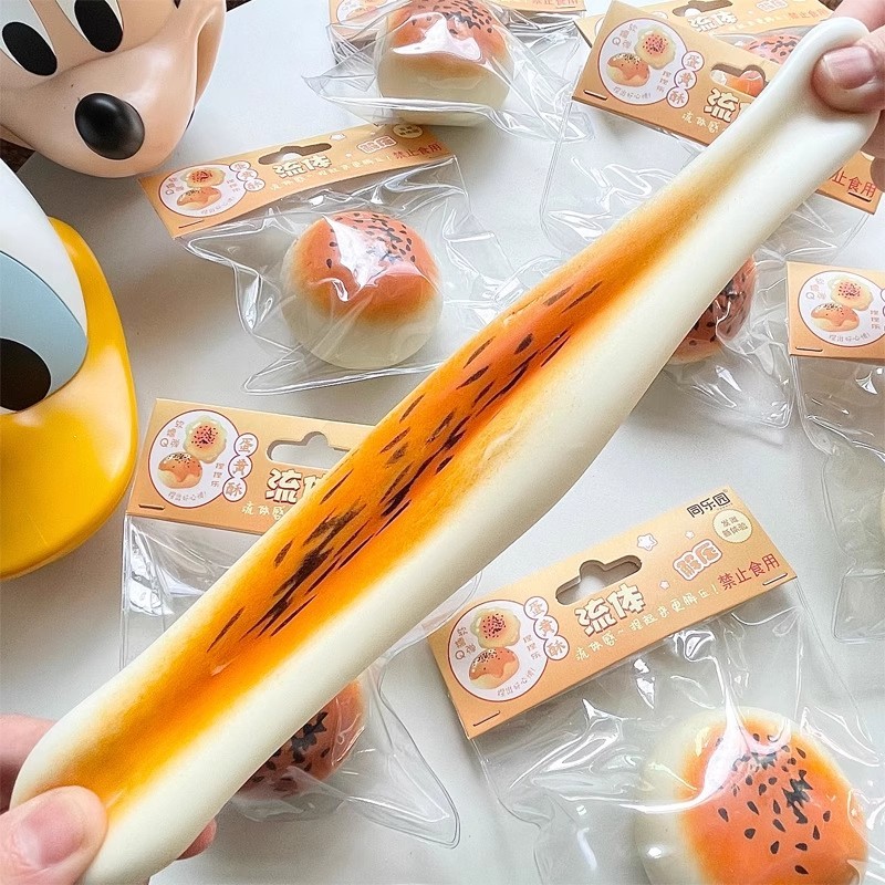 STARX Squishy Toy Fluid Squeeze Mochi - ขนมไข่แดง - ขนมปังนึ่งนมถั่วเหลือง - Soft Slow Rebound TPR สําหรับ Satisifying Squeezes - ของขวัญเด็กน่ารักใหม่