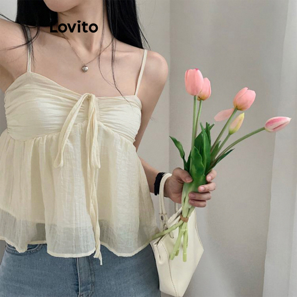 Lovito เสื้อสายเดี่ยวผู้หญิง แต่งจีบ ผูกโบว์หน้า สีพื้น สไตล์ลำลอง LNE52371