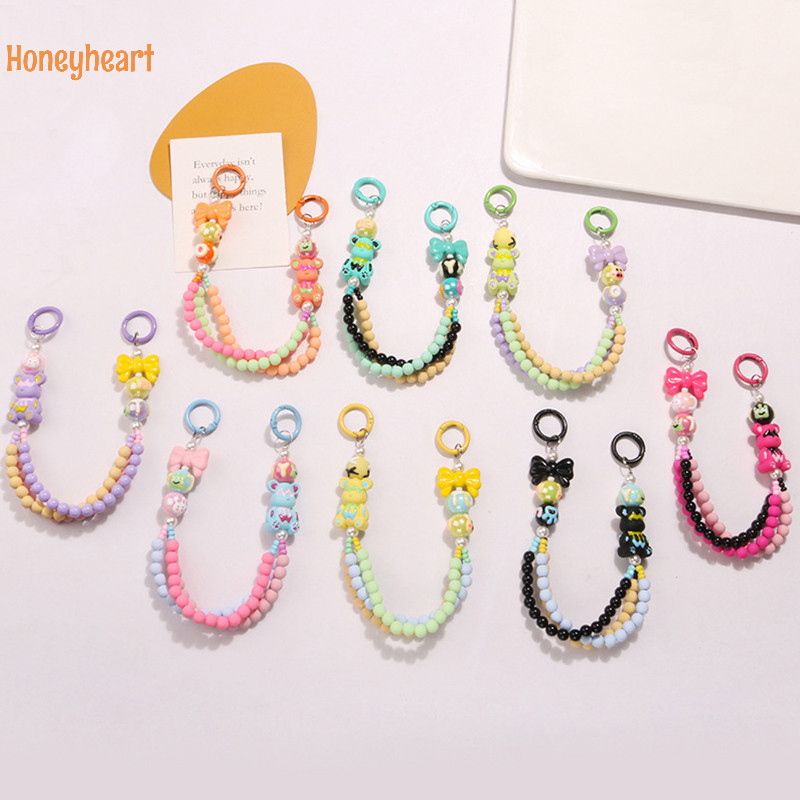 <Honeyheart> Fresh Fashion Colourful Bear Hand-ed Beaded Bow พวงกุญแจลูกปัดโทรศัพท์สําหรับผู้หญิงน่ารักหวานหูฟังกระเป๋าตกแต่ง Nice