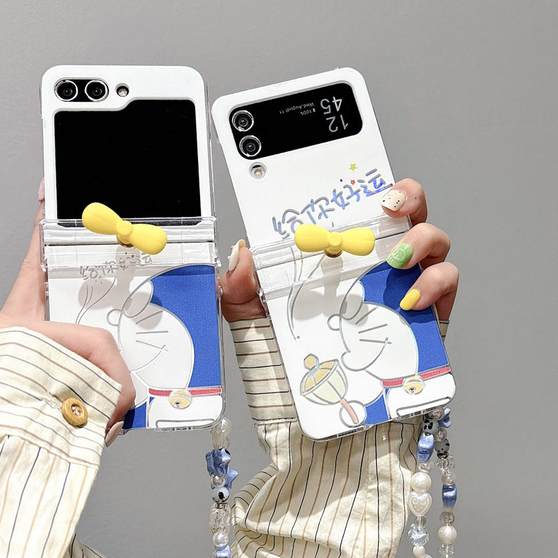 เคสโทรศัพท์แบบพับได้สําหรับ Samsung Galaxy Z Flip6 Flip5 Flip4 Flip3 กังหันลมน่ารัก Dingdang Cat พร้อมสร้อยข้อมือ hard tpu เคสโทรศัพท์
