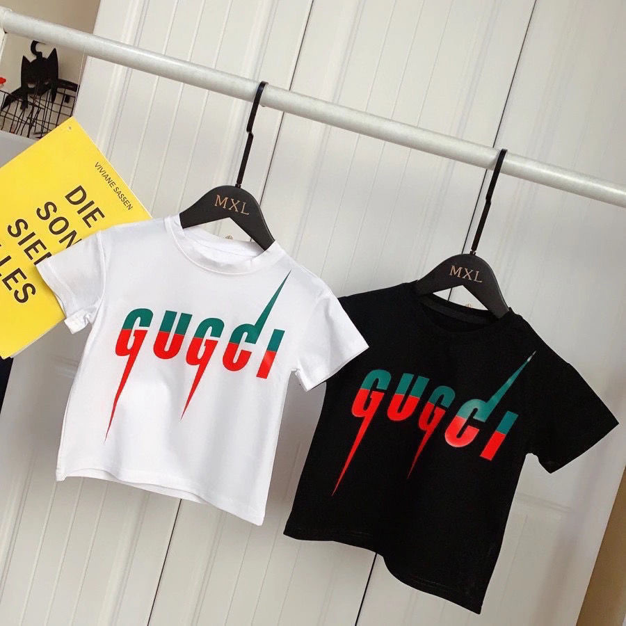 G GUCCI2024 เสื้อยืดเด็กผ้าฝ้ายคอกลมแขนสั้นผ้าฝ้ายชายหญิง GG แขนสั้น