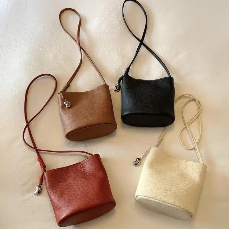 South Style Original Cowhide ของแท้หนังข้าวสาลี Field Party Bucket Bag หญิง Niche One-Shoulder Cross
