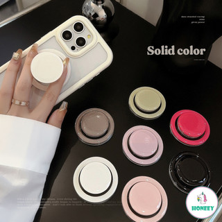 เกาหลี Macaron สีทึบวงเล็บแม่เหล็กโทรศัพท์ Grip Stand สําหรับ IPhone พับไร้สายชาร์จกรณี Lazy Desktop Holder แหวน