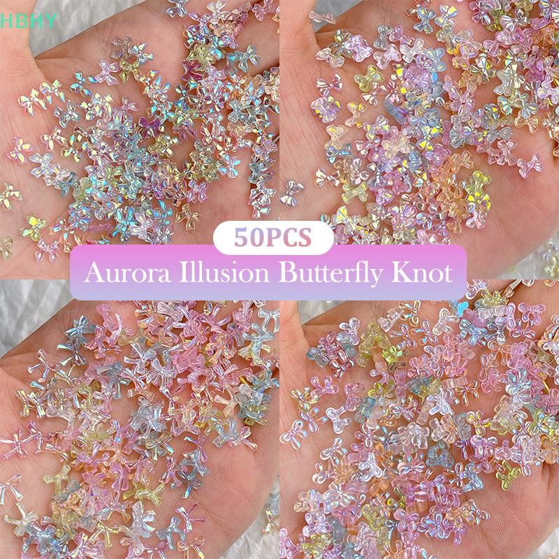HB 50 ชิ้นที่มีสีสันโบว์เล็บอุปกรณ์เสริมภาพลวงตา AB สีเรซิ่นริบบิ้น Bows ทําเล็บมือตกแต่ง Charm HY