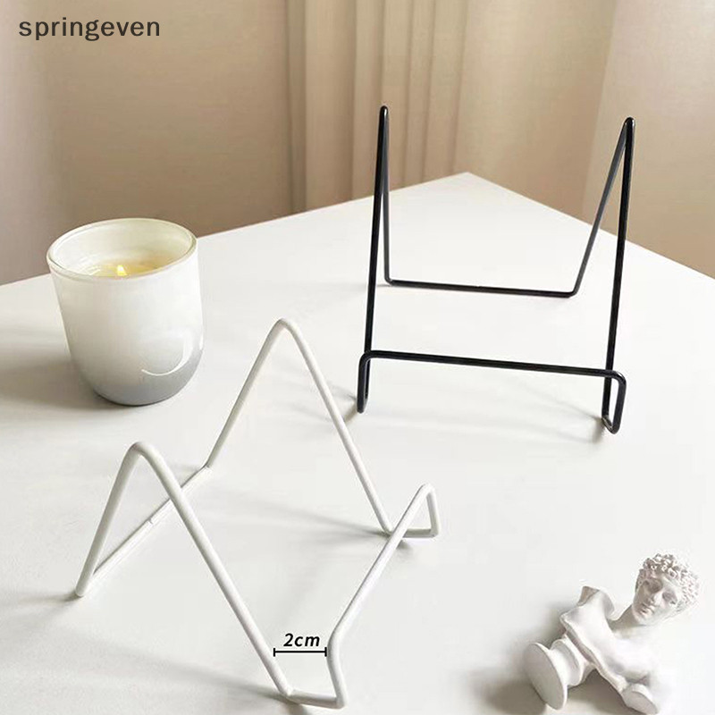 [springeven] ศิลปะเหล็กนิตยสารขาตั้งจอแสดงผลชั้นวางจานชามกรอบรูปสมุดภาพผู้ถือแท่นเครื่องประดับชั้นเก็บจานหุ้นใหม่