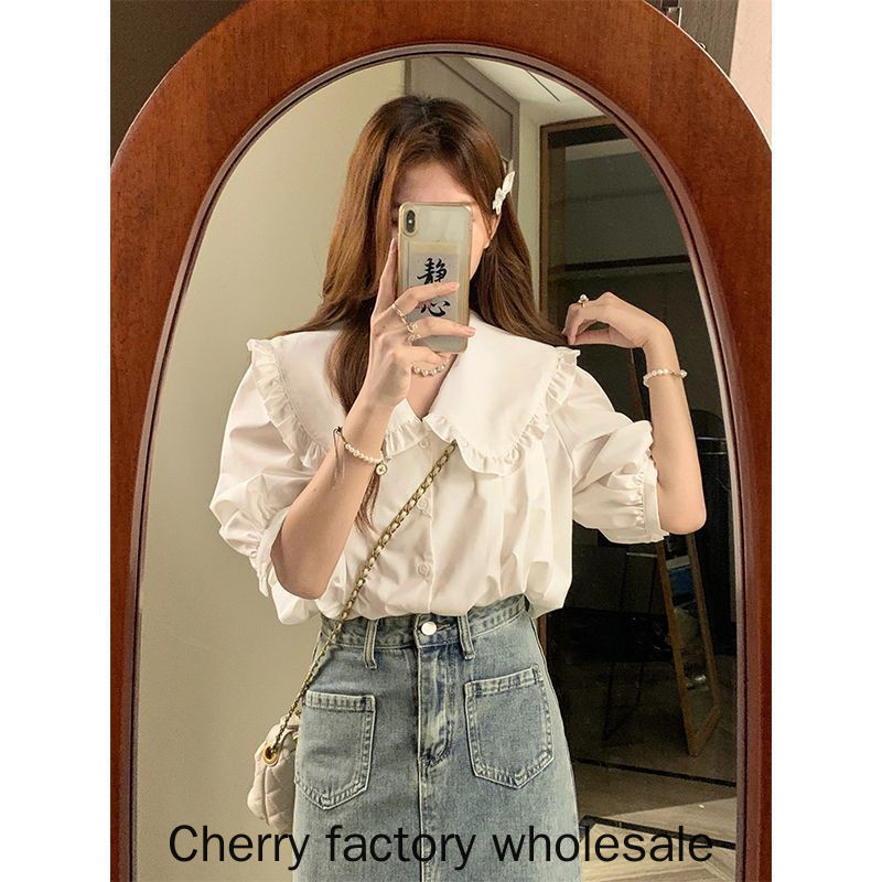 แฟชั่นผู้หญิงสไตล์ใหม่ผ้าฝ้ายสีขาวเสื้อแขนสั้นตุ๊กตาลูกไม้ลดอายุเสื้อผ้าผู้หญิงชั้นนํา