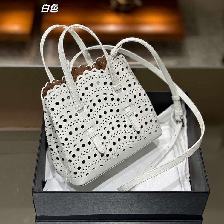 2024 สไตล์ใหม่ Tote Bag French Cowhide Handmade Bag Niche Laser แกะสลักหนังกลวงตะกร้าผักกระเป๋า