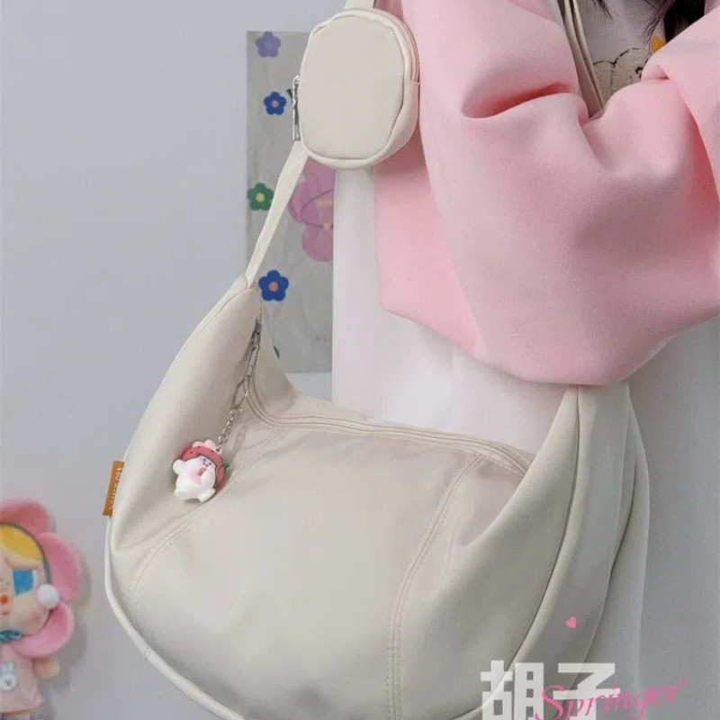 แฟชั่นสาวใหม่เกาหลีใต้กระเป๋าสะพายข้างเรียบง่ายสีทึบซอกเดินทางนักเรียนไหล่พักผ่อน ทั้งหมด-ใน-หนึ่ง ความจุขนาดใหญ่กระเป๋า