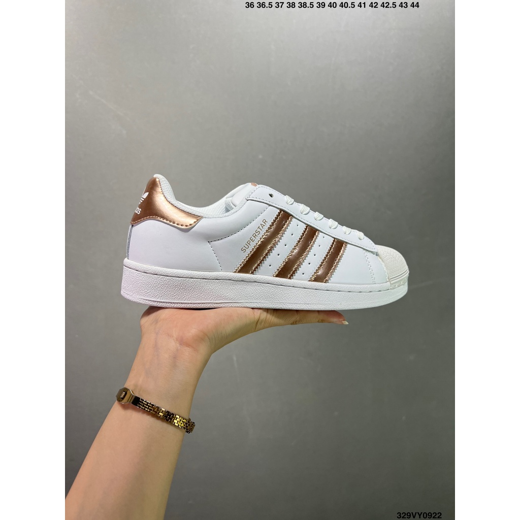 ที่มีคุณภาพสูง AD SUPERSTAR เชลล์หัวชุดสีขาวทองรองเท้าลำลองรองเท้ากีฬาน้ำหนักเบาใช้ได้ทั้งในร่มและกลางแจ้ง