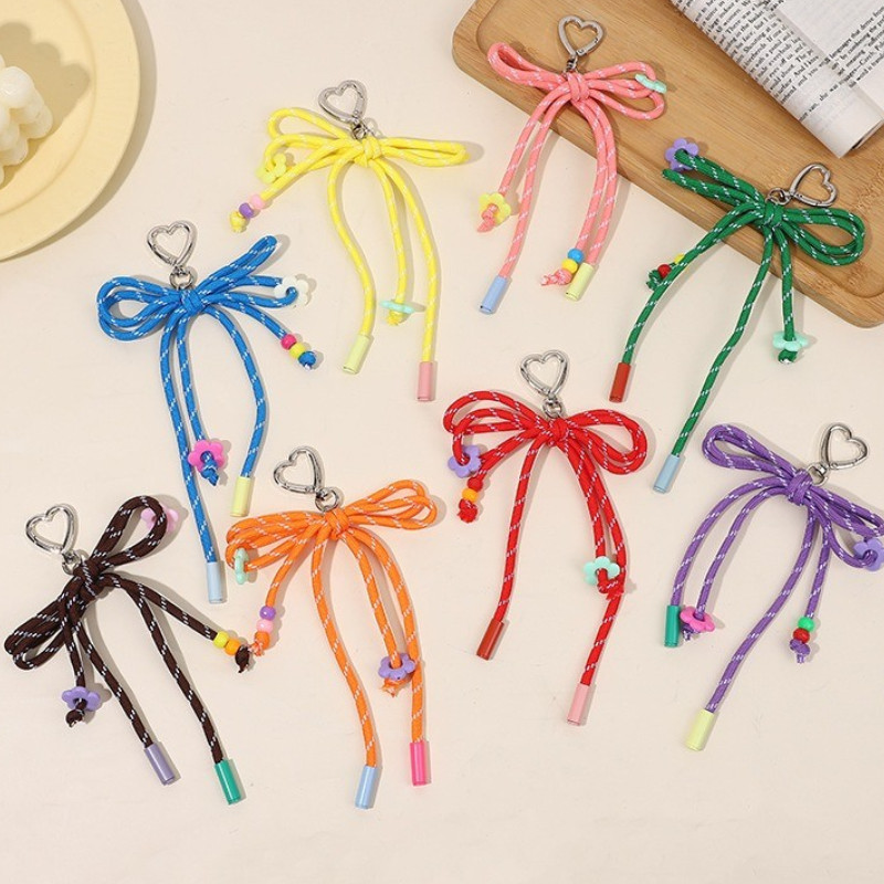 พวงกุญแจเชือกโบว์หลากสี หัวใจโลหะ งานฝีมือประณีต เพิ่มความสวยงามให้กับกระเป๋าและเครื่องแต่งกาย เป็นของขวัญที่เหมาะมาก