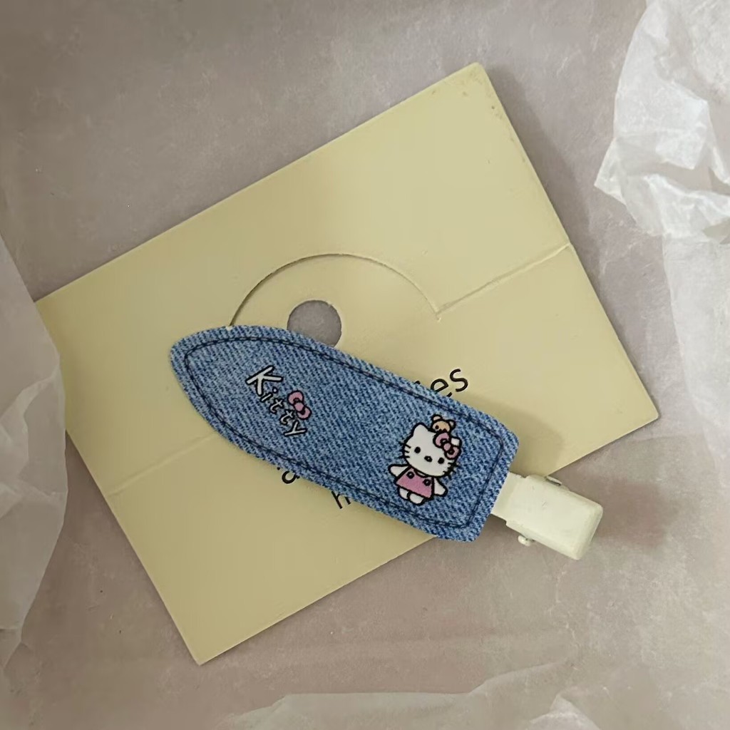 ผ้ายีนส์สีฟ้าสไตล์ญี่ปุ่น มีลายแมวน่ารักและรายละเอียดที่ด้านข้างเรียบหรู - รูปที่ 2