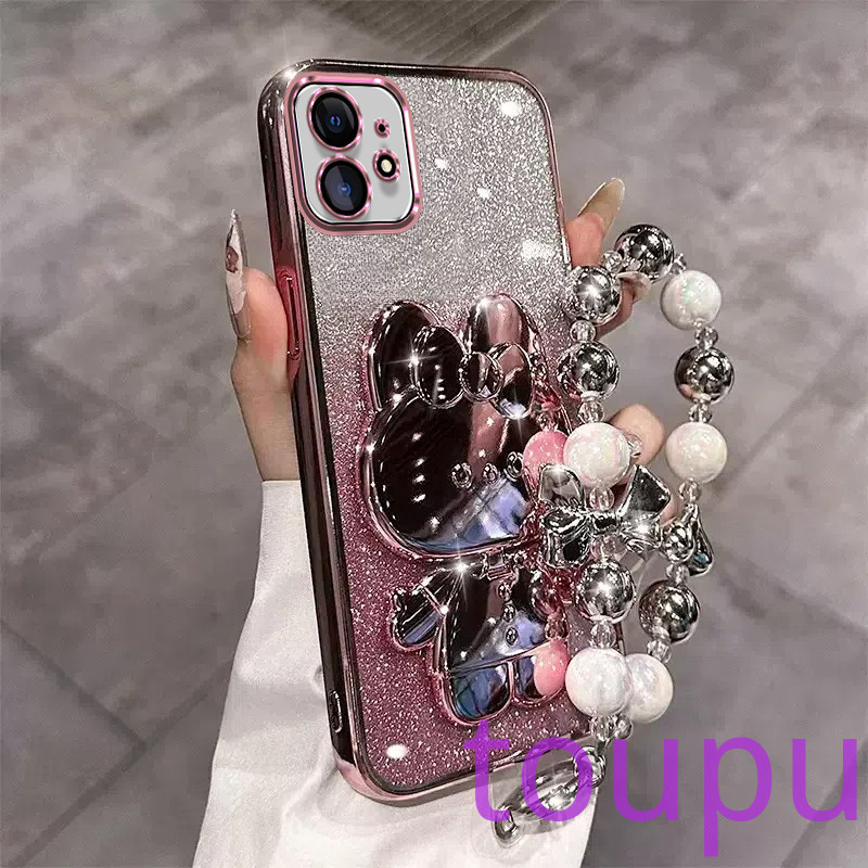 เคส iPhone 11 11 Pro 11 Pro Max 12 12 Pro 12 Pro Max 13 13 Pro 13 Pro Max 14 14 Plus 14 Pro 14 Pro Max 7 Plus 8 Plus Xs XR Xs Max กรณีโทรศัพท์หรูหราน่ารักกระต่ายแต่งหน้ากระจกใส Glitter กรณีโทรศัพท์ใสพร้อมสร้อยข้อมือเชือกขนาดเล็ก กรณีโทรศัพท์iPhone 11 11 P