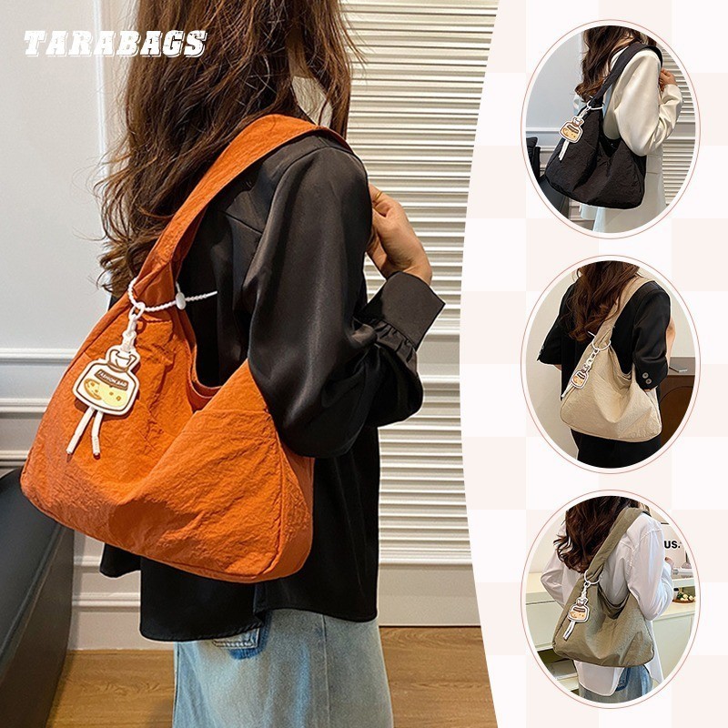 Tarabags กระเป๋าผ้าใบควา กระเป๋าผู้หญิงเกาหลีรุ่นขนาด ใหญ่ความจุไนลอนอเนกประสงค์ งผ้าใบขนาดใหญ่