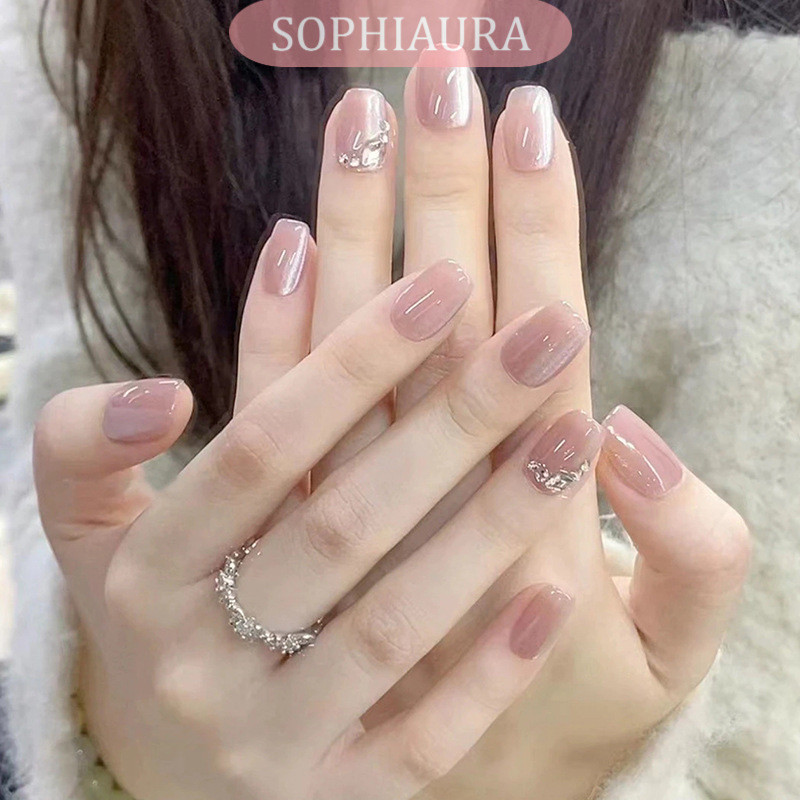 [กาวฟรี]สีเบจเล็บปลอมแมวตาออกแบบสี่เหลี่ยมสั้นออกแบบ พลอยเทียม เปลือยสีเป็นกลางกดบนเล็บสําหรับสาวเล็บปลอมที่ใช้ซ้ําได้ด้วยกาวสติกเกอ