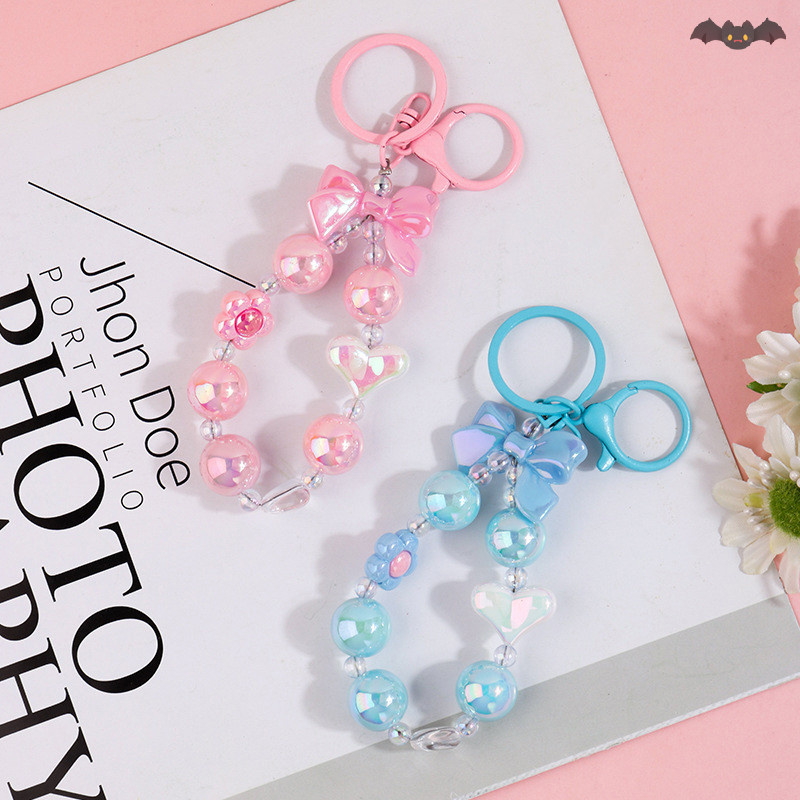 [PE] หวานสีสันโบว์ลูกปัดพวงกุญแจจี้กระเป๋าหูฟังโทรศัพท์กรณีอุปกรณ์ตกแต่งแฟชั่นbowknotลูกปัดพวงกุญแจของขวัญth