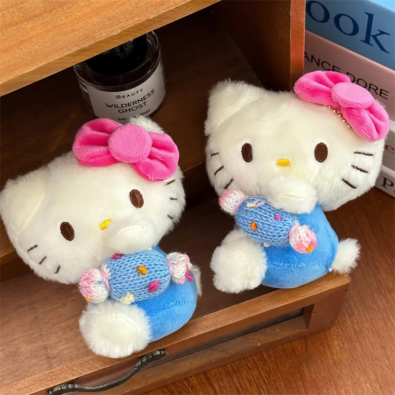 โบว์สีแดง Hello Kitty พวงกุญแจน่ารักตุ๊กตาแมวพวงกุญแจนักเรียนกระเป๋าอุปกรณ์เสริมของขวัญอุปกรณ์
