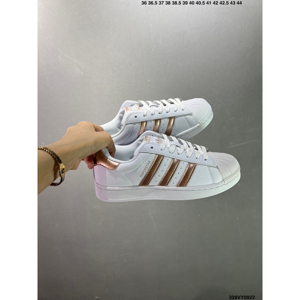ที่มีคุณภาพสูง AD SUPERSTAR เชลล์หัวชุดสีขาวทองรองเท้าลำลองรองเท้ากีฬาน้ำหนักเบาใช้ได้ทั้งในร่มและกลางแจ้ง