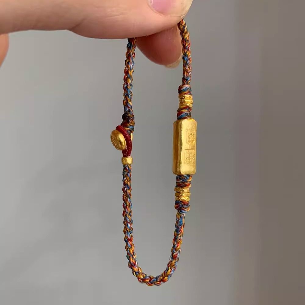 สร้อยข้อมือเชือกถักหลากสีสไตล์ทิเบตกว่าสมัยชาติพันธุ์ พร้อมนำโชคอารมณ์ย้อนยุค