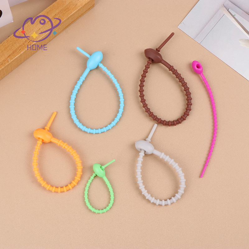 [mayhome] 10 ชิ้นน่ารักสีลูกกวาดซิลิโคนนํามาใช้ใหม่กระเป๋าผูกบิดลวดเคเบิ้ลเคเบิ้ลเคเบิ้ลผูกซิปชุดหูฟังสายข้อมูลสายรัดเชือกเส้นเล็กสากล {TH}