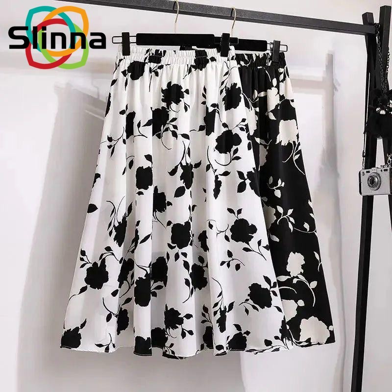 กระโปรงทรงเอพิมพ์ลายลําลองแฟชั่นใหม่ของผู้หญิงหลวมและบางอเนกประสงค์กระโปรงร่มเอวสูง